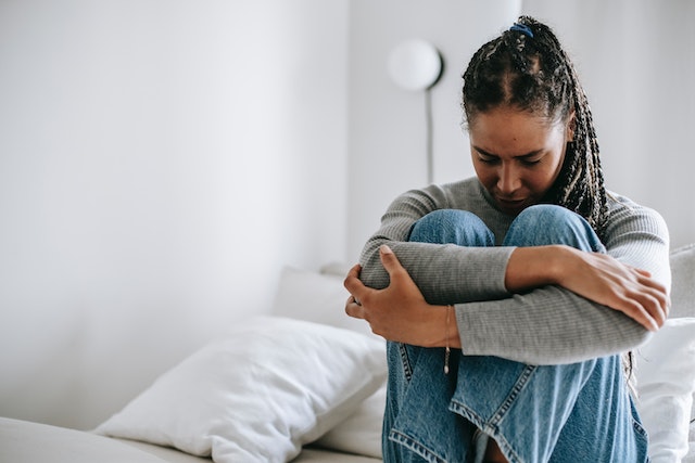 woman experiencing suffering