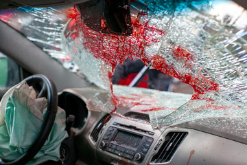 bloody broken windshield of car