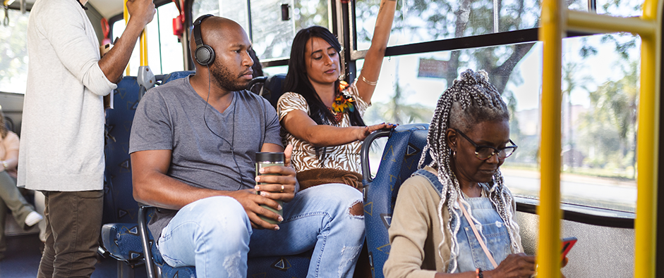 A public bus packed with passengers; Mass Transit Accident Attorneys concept image