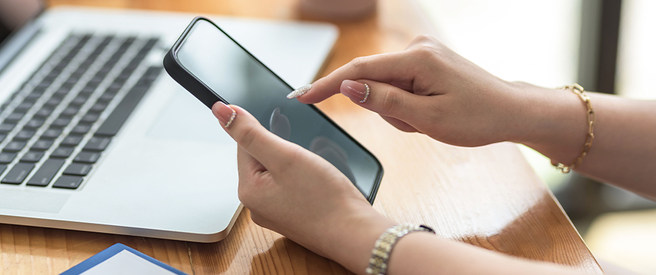 Woman hand using smartphone order goods online