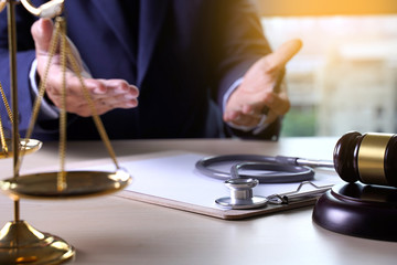 gavel stethoscope and lawyer