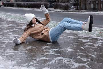 woman falling on the sidewalk