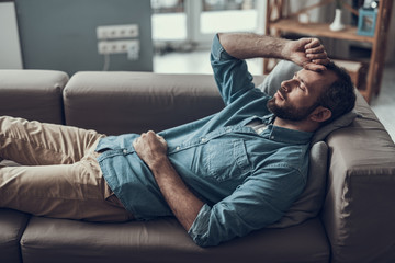 depressed man on couch