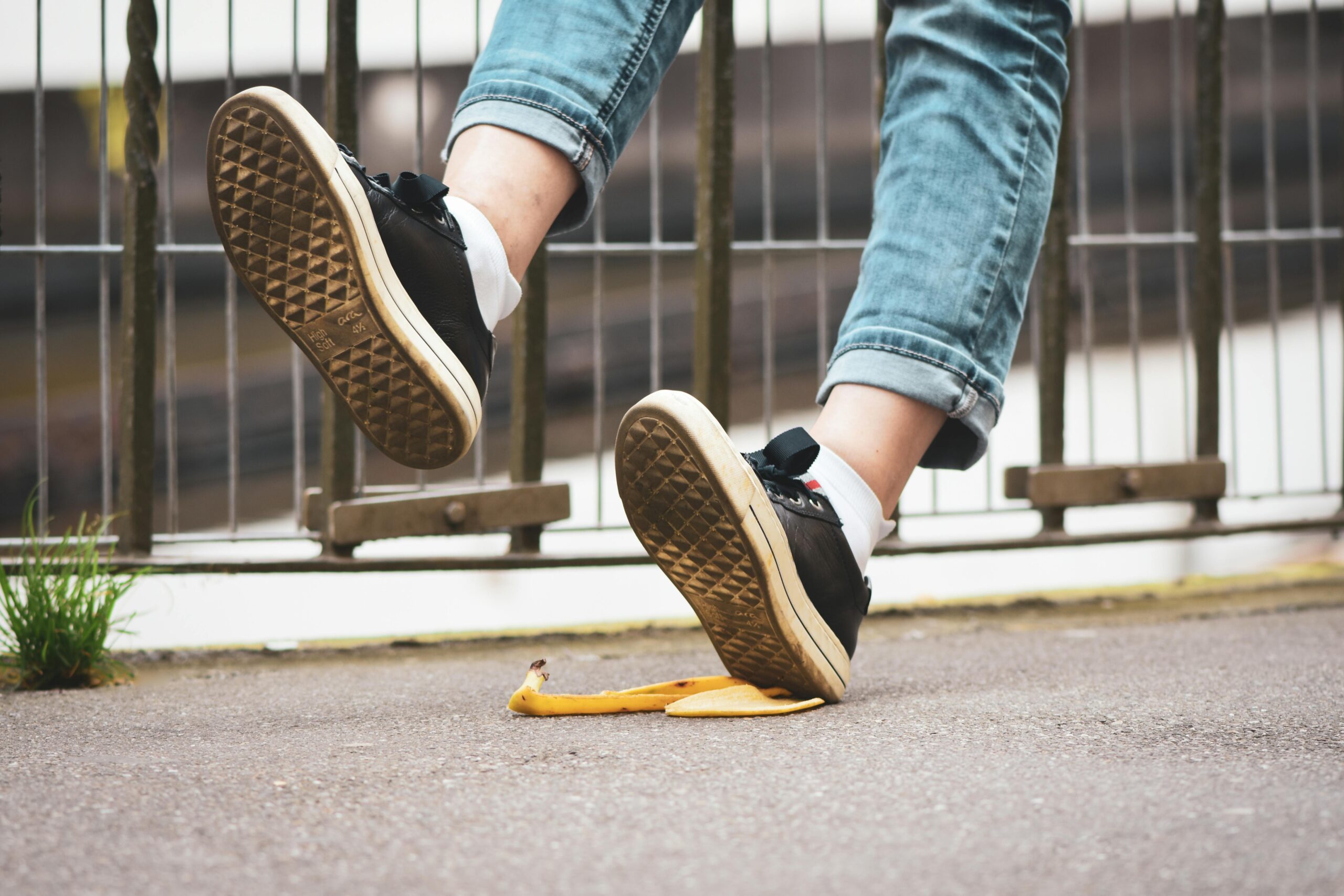 person slipping on banana peel
